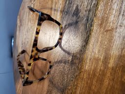 I am happy with my new glasses,  job well done on the prescription. Th0